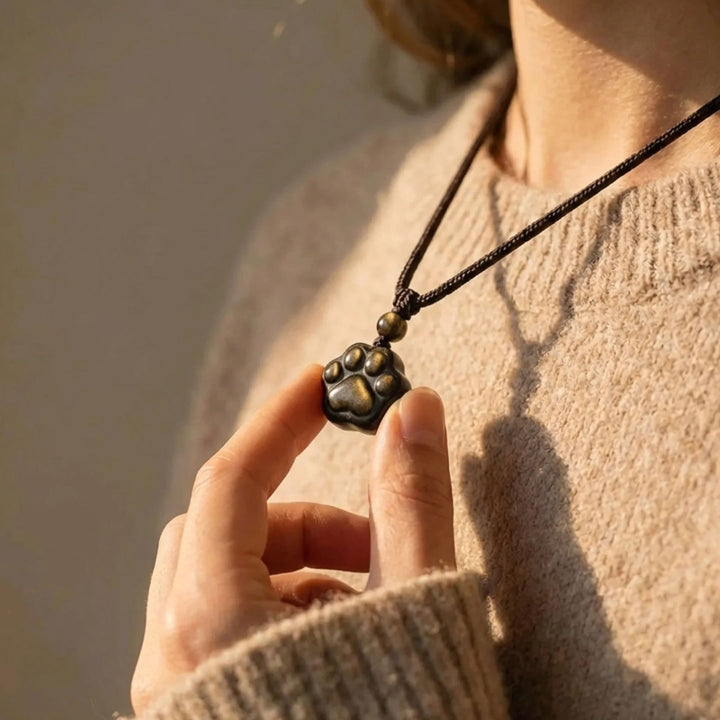 Pendentif Patte "Lien Éternel" en Obsidienne Dorée