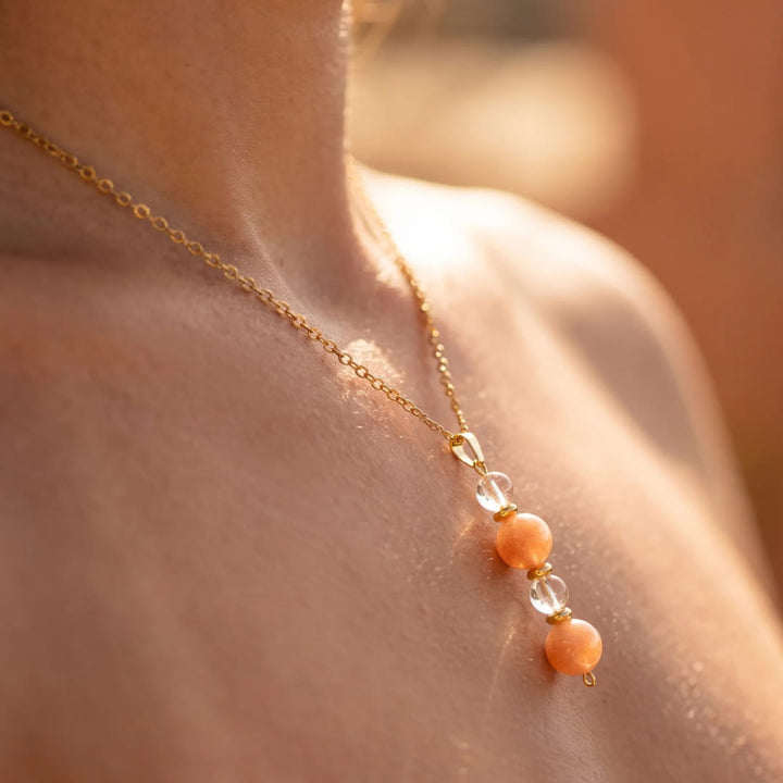 Pendentif "Aube Claire" en Pierre de Soleil et Cristal de Roche