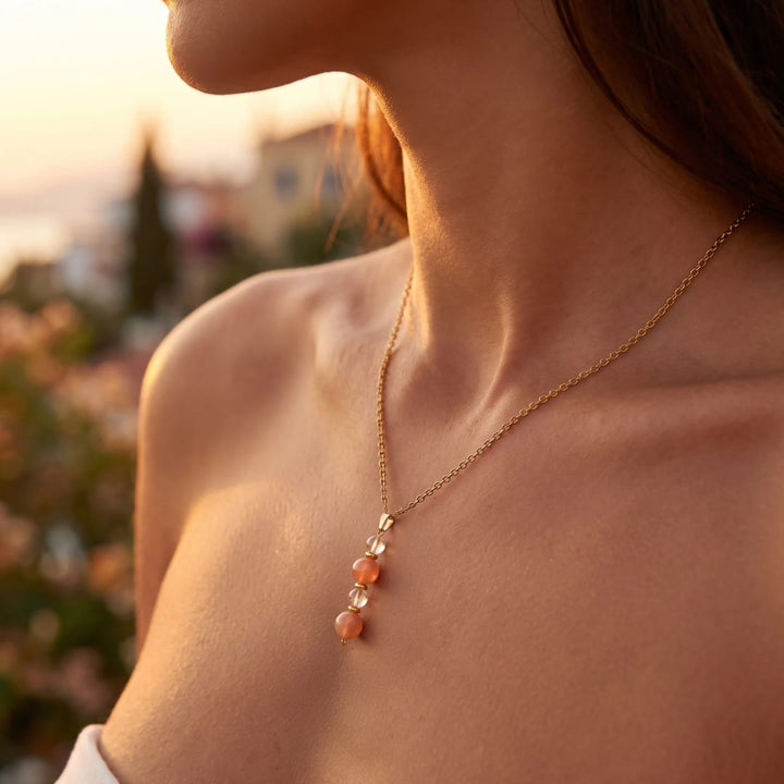 Pendentif "Aube Claire" en Pierre de Soleil et Cristal de Roche