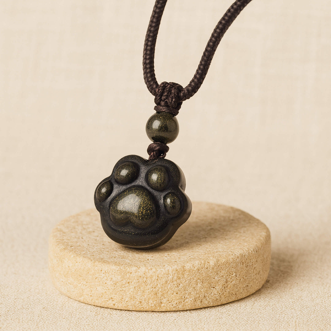 Pendentif Patte "Lien Éternel" en Obsidienne Dorée