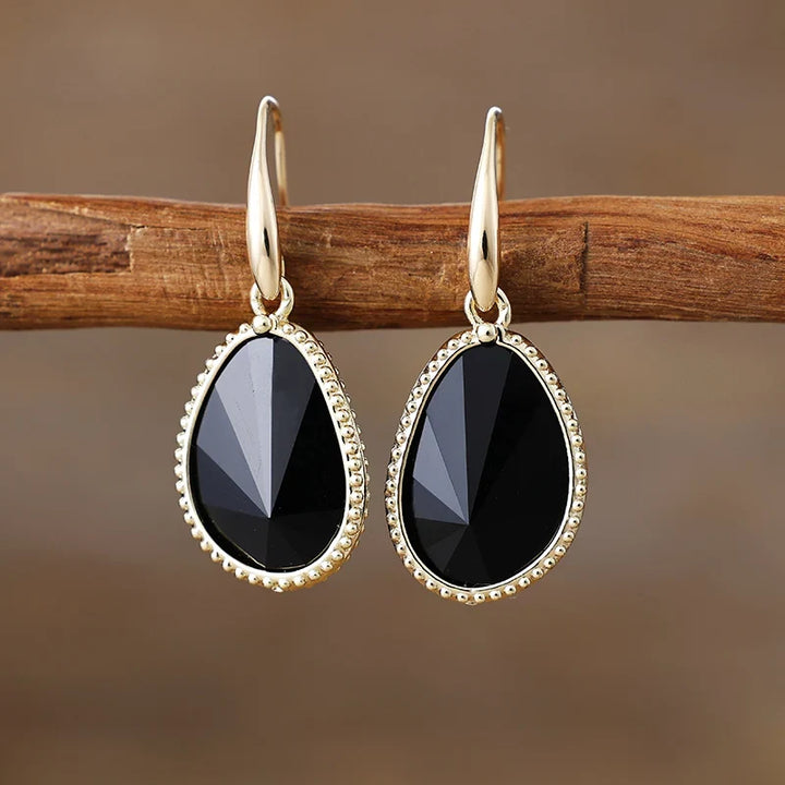 Boucles d'Oreilles "Symbole de Force" en Onyx