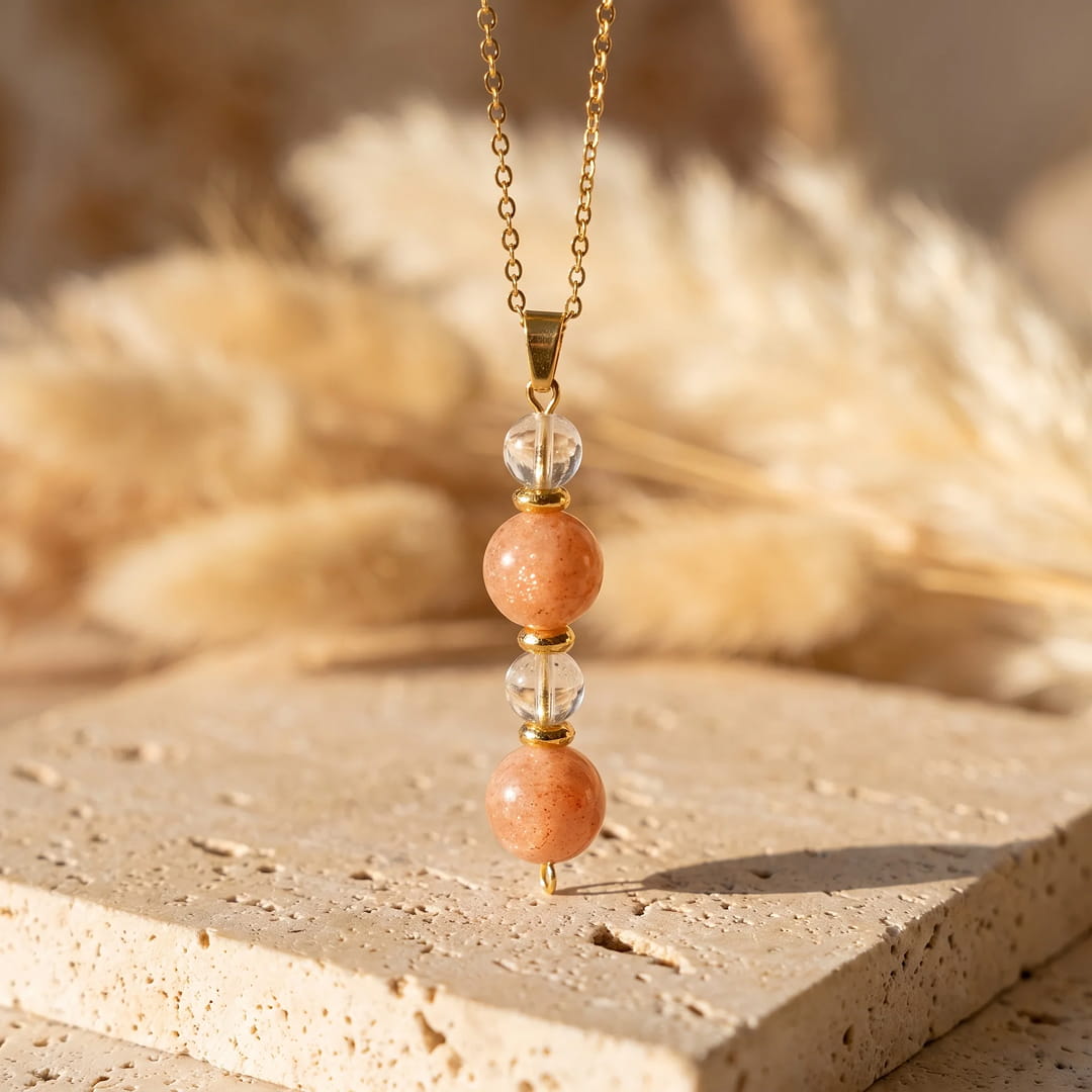 Pendentif "Aube Claire" en Pierre de Soleil et Cristal de Roche
